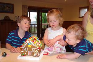 Decorating a gingerbread house